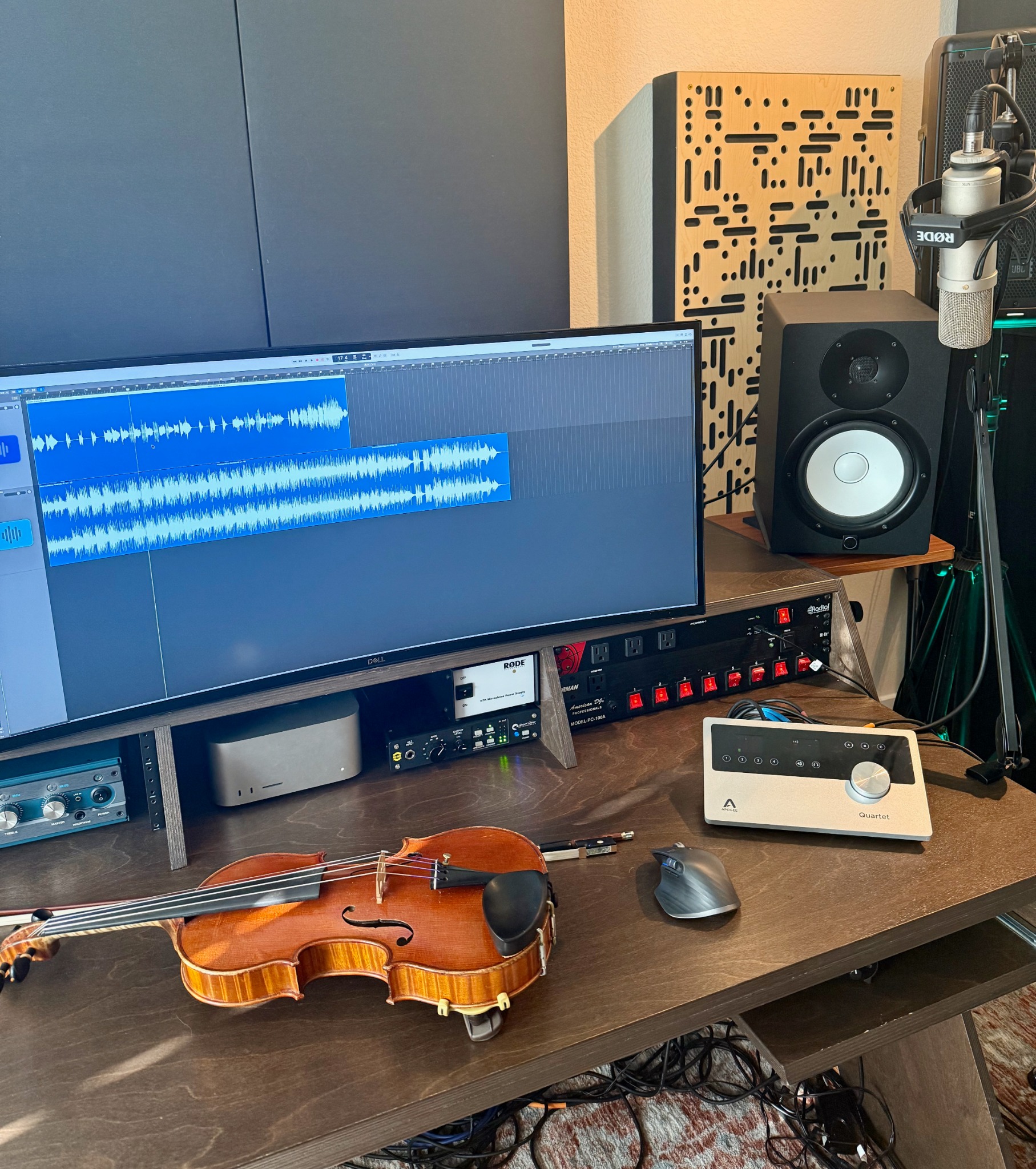 French violin, microphone, Apogee interface, studio monitor, and active Logic recording session in David Price's Austin studio