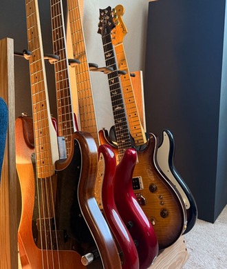 Electric guitars and basses in David Price's working musician studio